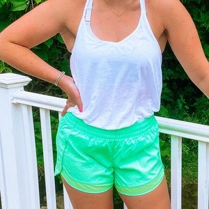 bright green athleta running shorts